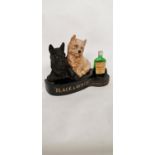 Black & White Whisky Scottie Dogs rubberoid advertisement.