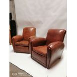 Pair of exceptional quality 1940's leather upholsterd club chairs.