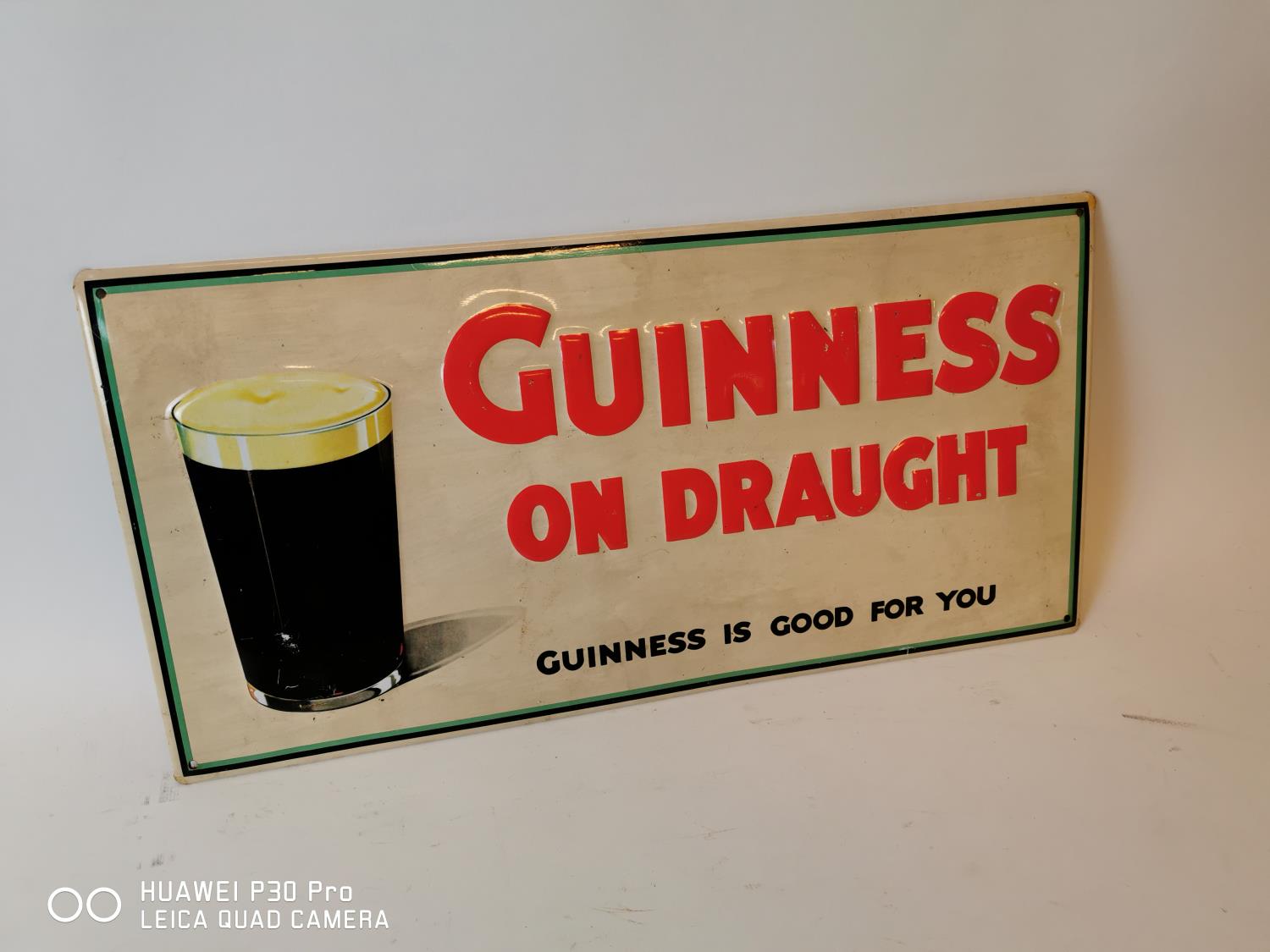 Guinness on Draught tin plate sign.