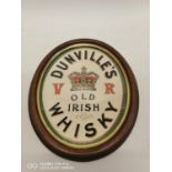 Oval framed Dunville's Irish whiskey print. (35 ch H x 29 cm D