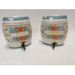 Pair of early 20th. C. ceramic spirit dispensers.