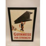 Framed Guinness for Strength Girder Man advertisement. (82 cm h x 57 cm W).
