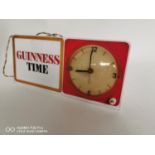 Guinness advertising clock.