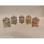 Set of five ceramic spirit barrels.