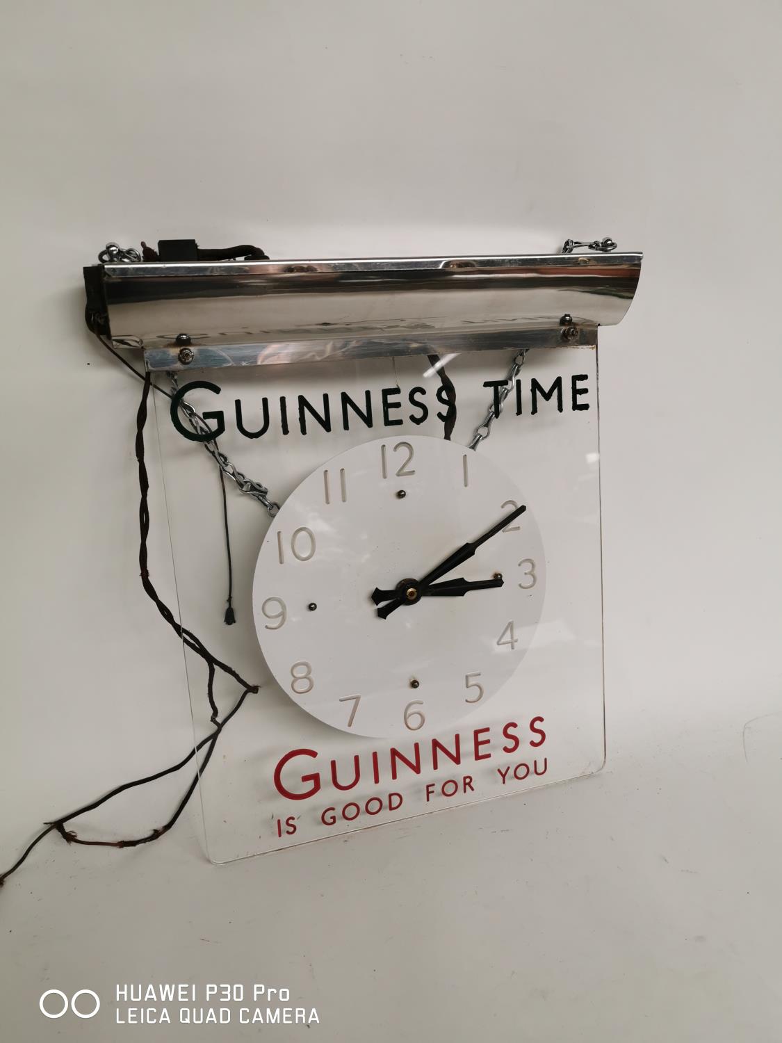 Guinness Time hanging advertising Clock.