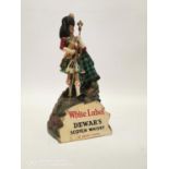 White Label Dewar's Scotch Whisky advertising figure.