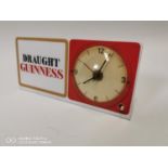 Draught Guinness advertising clock.