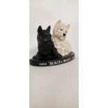 Black & White Whisky Scottie Dogs rubberoid advertisement.