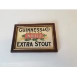 Guinness & Co Extra Stout advertisement.