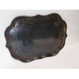 Early 20th C. laquered mahogany tray .