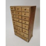 Early 20th C. bank of milliners drawers {51 cm H x 30 cm W x 18 cm D}.