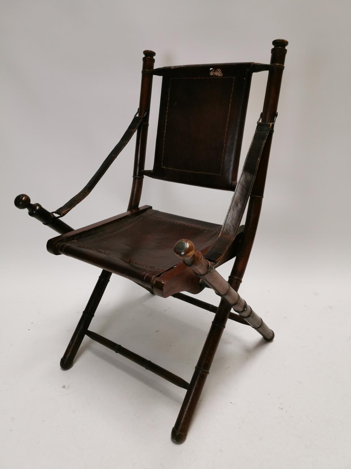 Unsual mahogany and leather folding chair {92 cm H x 50 cm W x 55 cm D}.