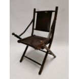 Unsual mahogany and leather folding chair {92 cm H x 50 cm W x 55 cm D}.
