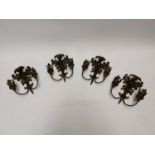 Set of four decorative metal wall ensconces in the Rococco style {40 cm H x 37 cm W x 17 cm D each}.