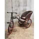 Vintage model of a metal and wicker trike. {32 cm h x 60 cm L x 24 cm D}.