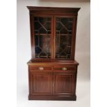 Good quality Edwardian mahogany crossbanded bookcase with astragal glazed doors and interior shelves