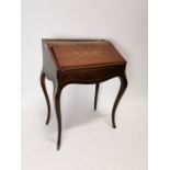 Good quality 19th C. inlaid rosewood bonheur du jour with fitted interior on cabriole legs with ormo