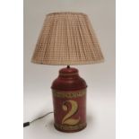 Early 20th C. hand painted metal tea bin in the form of a lamp.