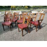 Set of ten Edwardian oak dining chairs.