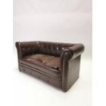 Unusual 1970's leather child's Chesterfield sofa. {53 cm H x 107 cm W x 50 cm D}.