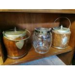 Two oak and silver plate biscuits barrels and one cut glass biscuit barrell.