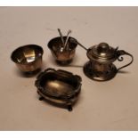 Collection of silver salt bowls and mustard bowl.