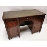 Good quality 19th C. mahogany and ebonised inlaid kneehole desk.