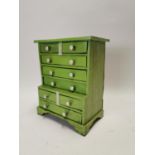 Neat painted pine chest of drawers with turned handles. {62 cm H x 53 cm W x 32 cm D}.