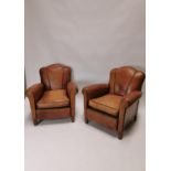 Pair of exceptional quality Art Deco tanned leather club chairs {82 cm H x 77 cm W x 76 cm D each}.