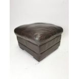Brown leather ottoman. {42 cm H x 60 cm W x 61 cm D}.
