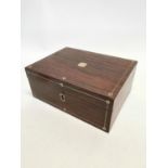 19th C. rosewood writing box with mother of pearl inlay {13 cm H x 30 cm W x 22 cm D}.