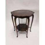 Edwardian mahogany centre table on cabriole legs and pie crust top {70 cm H x 65 cm Dia.}.
