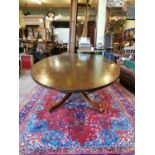 Good quality oval mahogany dining table in the Regency style {71 cm H x 235 cm W x 121 cm D}.