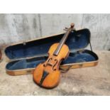 Early 20th. C. child's violin in original case.{71 cm H x 20 cm L x 7 cm D}