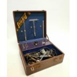 1950s medical instrument set in vinyl case {11 cm H x 27 cm W x 25 cm D}.