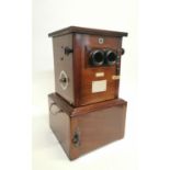Exceptional early 20th. C. mahogany Stereoscope with original slides of military depictions glass sl