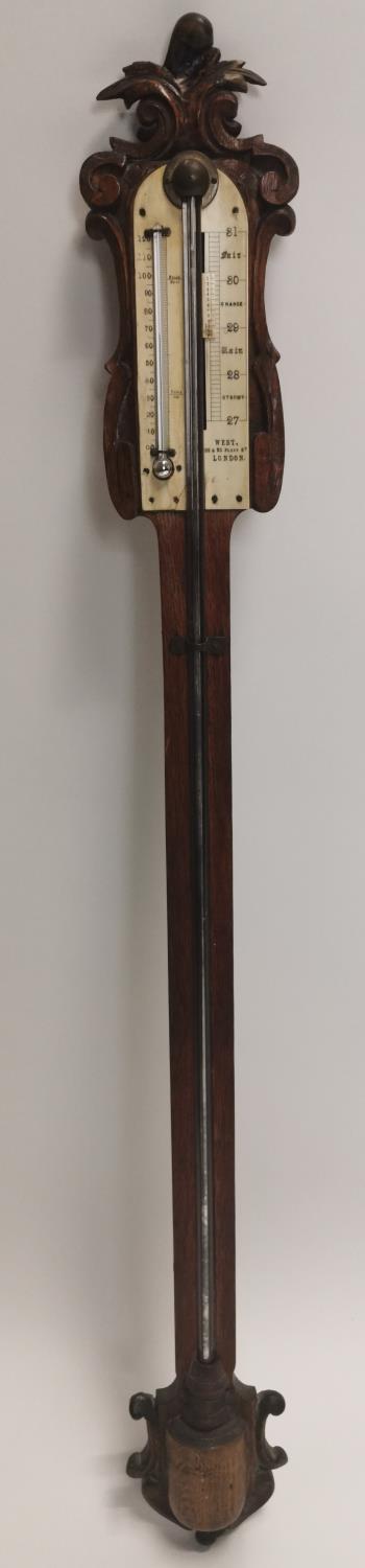 19th. C. carved oak stick barometer.