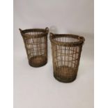 Pair of early 20th C. wicker baskets {70 cm H x 49 cm Dia.}.