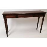 19th C. mahogany console table with three drawers in the frieze raised on turned legs {92 cm H x 153