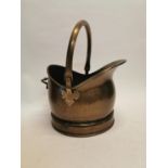 Brass coal helmet {42 cm H x 28 cm W x 30 cm D}.