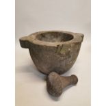 Early carved 19th. C. limestone mortar and pestle. { 26 cm H x 48 cm diam}.