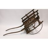 19th C. pine dog cart with metal spoke wheels {84 cm H x 160 cm W x 58 cm D}.