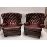 Pair good quality leather deep buttoned barrel back arm chairs {106 cm H x 101 cm W x 92 cm D each}.