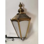 Brass lantern with original bracket. {83 cm H x 49cm W x 80 cm D}.