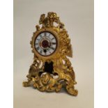 Gilded metal mantle clock.