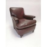 Early 20th C. leather easy chair on turned mahogany legs {86 cm H x 76 cm W x 91 cm D}.