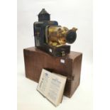 Exceptional quality brass and mahogany Magic Lantern in working order with original Instruction manu