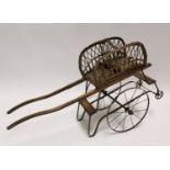 Rare 19th C. pine and wicker child's hand cart .