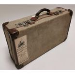 Early 20th C. canvas and leather suitcase.