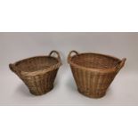 Two early 20th C. wicker baskets with handles.